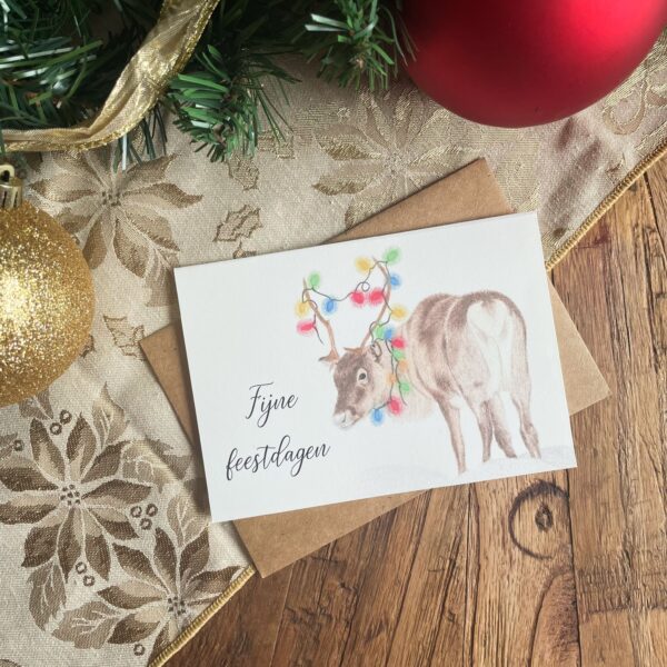 Kerstkaart rendier met kerstlampjes
